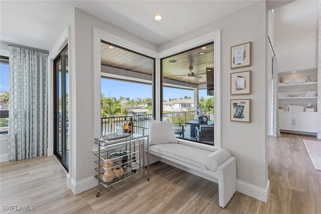 434 Trade Winds Ave, Naples, FL 34108 - living area featuring light wood-type flooring, ceiling fan, and recessed lighting