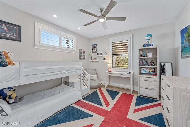434 Trade Winds Ave, Naples, FL 34108 - bedroom featuring multiple windows, recessed lighting, ceiling fan, and wood finished floors