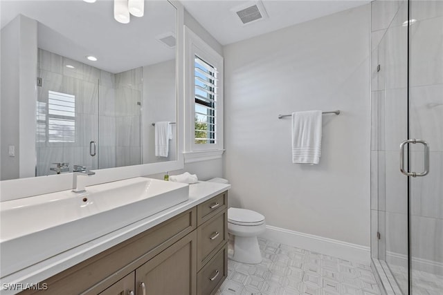 434 Trade Winds Ave, Naples, FL 34108 - bathroom featuring vanity, a shower stall, and tile patterned floors