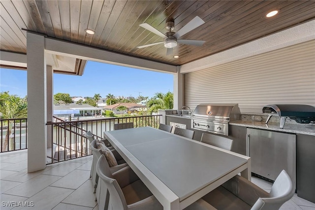 434 Trade Winds Ave, Naples, FL 34108 - view of patio with area for grilling, ceiling fan, and outdoor dining area