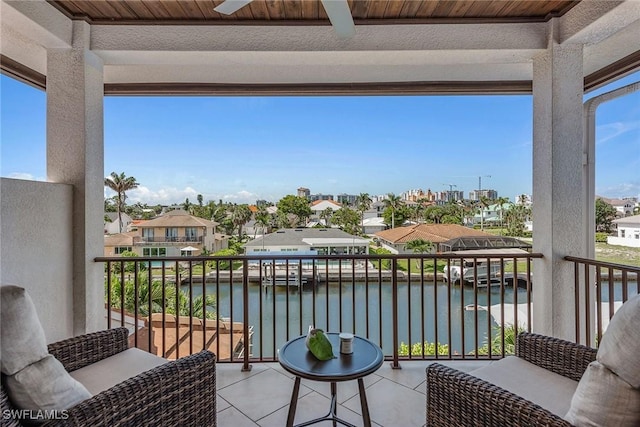 434 Trade Winds Ave, Naples, FL 34108 - balcony featuring a water view, a residential view, and ceiling fan