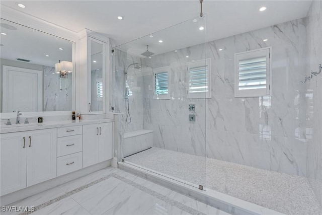 434 Trade Winds Ave, Naples, FL 34108 - bathroom with a marble finish shower, recessed lighting, double vanity, and marble tiled floors