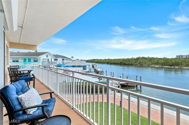 1208 Edington Pl Unit E204, Marco Island, FL 34145 - balcony with a water view and a boat dock