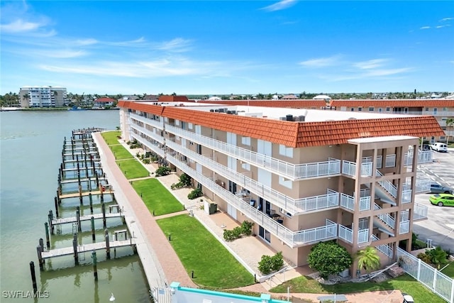 1208 Edington Pl Unit E204, Marco Island, FL 34145 - view of apartment building / complex featuring a water view