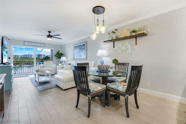 1208 Edington Pl Unit E204, Marco Island, FL 34145 - dining area with ceiling fan, light wood-style flooring, and crown molding