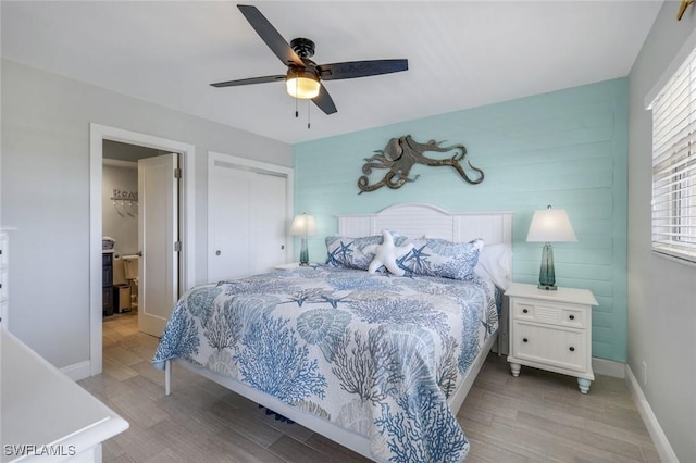 1208 Edington Pl Unit E204, Marco Island, FL 34145 - bedroom featuring light wood-type flooring, a closet, and ceiling fan