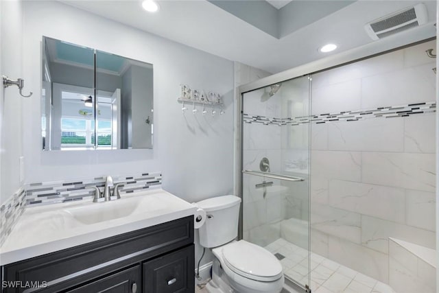 1208 Edington Pl Unit E204, Marco Island, FL 34145 - bathroom with vanity, a stall shower, ceiling fan, recessed lighting, and tasteful backsplash