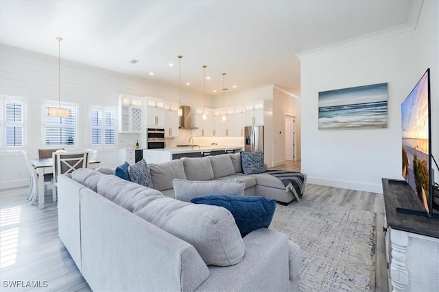 9088 Caicos Way, Naples, FL 34114 - living room featuring light wood-style floors and recessed lighting