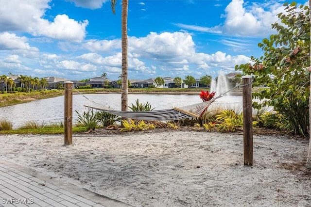 9088 Caicos Way, Naples, FL 34114 - wooden deck with a residential view and a water view
