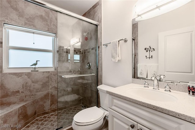 816 E Elkcam Cir Unit 305, Marco Island, FL 34145 - bathroom featuring vanity and a shower stall