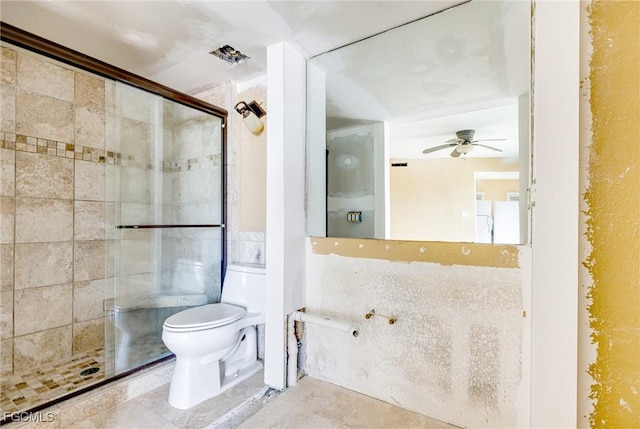 4750 Estero Blvd Unit 101, Fort Myers Beach, FL 33931 - full bath featuring a shower stall, a ceiling fan, and tile patterned flooring