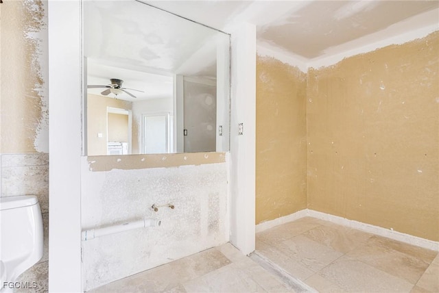 4750 Estero Blvd Unit 101, Fort Myers Beach, FL 33931 - bathroom featuring toilet and ceiling fan