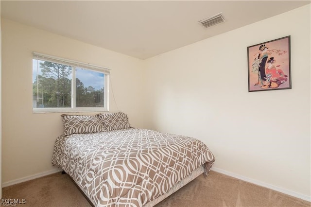 5201/5203 26th St SW, Lehigh Acres, FL 33973 - carpeted bedroom featuring baseboards