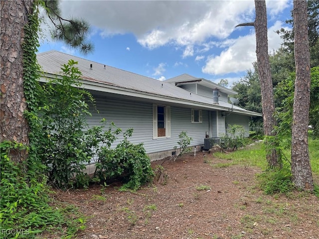 6292 Morgan La Fee Ln, Fort Myers, FL 33912 - rear view of house featuring a metal roof