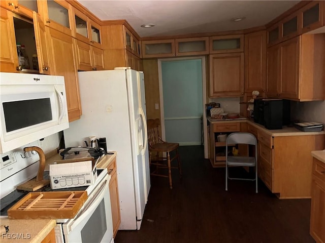 6292 Morgan La Fee Ln, Fort Myers, FL 33912 - kitchen featuring white appliances, a desk, light countertops, glass insert cabinets, and recessed lighting