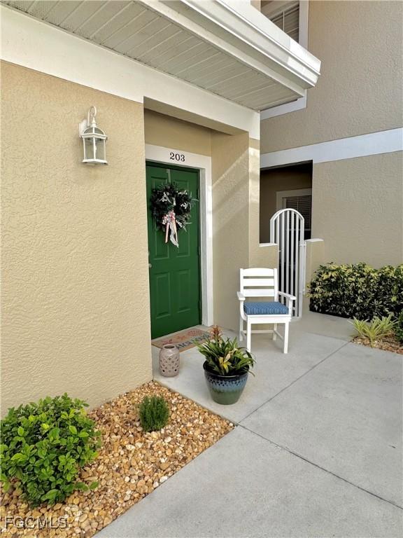 5135 Cobble Creek Ct Unit 203, Naples, FL 34110 - photo 2