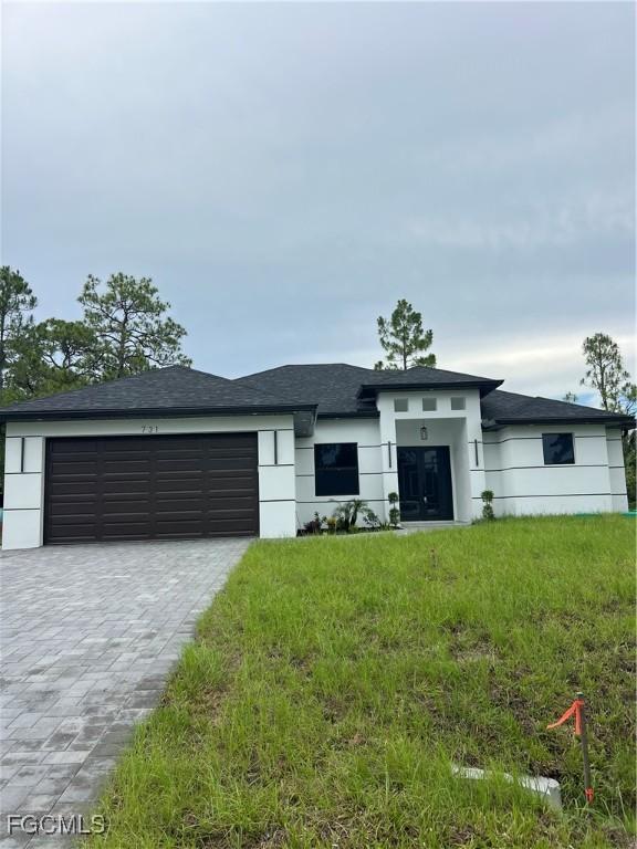 731 Chattman St E, Lehigh Acres, FL 33974 - photo 1