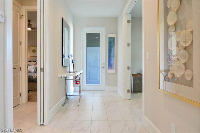 hallway with light tile floors