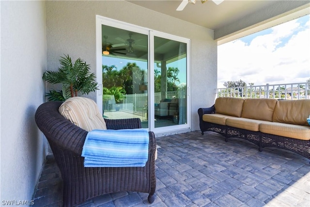 view of patio / terrace featuring outdoor lounge area and ceiling fan