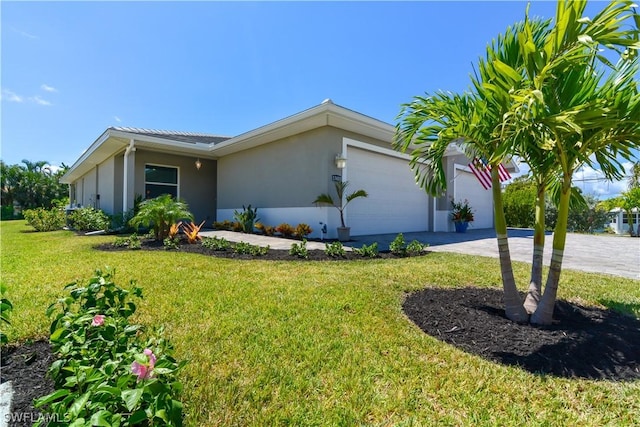 view of property exterior with a lawn and a garage