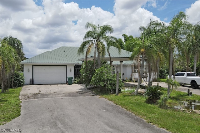 view of front of property featuring a garage