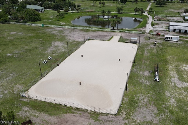 drone / aerial view with a rural view and a water view