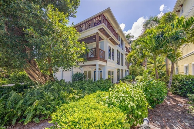 view of front of home with a balcony