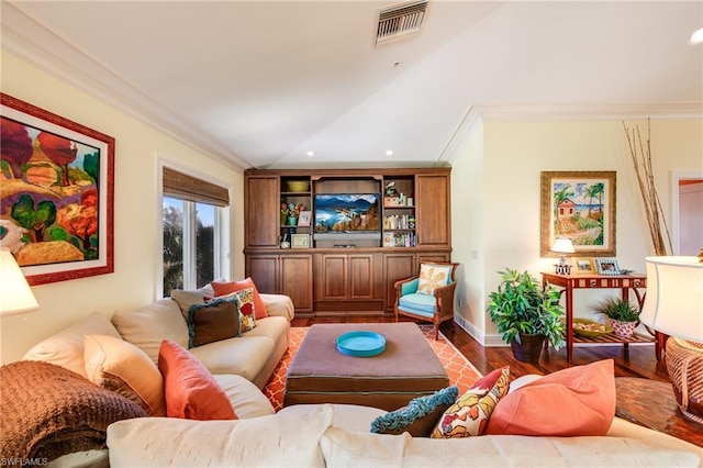 living room featuring dark hardwood / wood-style flooring and ornamental molding