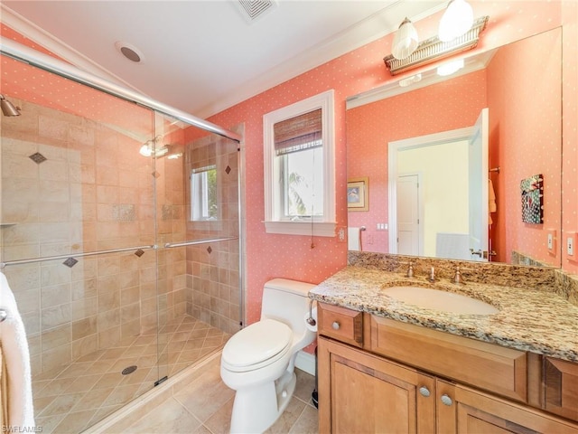 bathroom with a shower with door, tile flooring, large vanity, and toilet