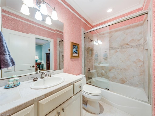 full bathroom with toilet, vanity, ornamental molding, combined bath / shower with glass door, and tile flooring