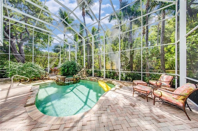 view of swimming pool with a patio