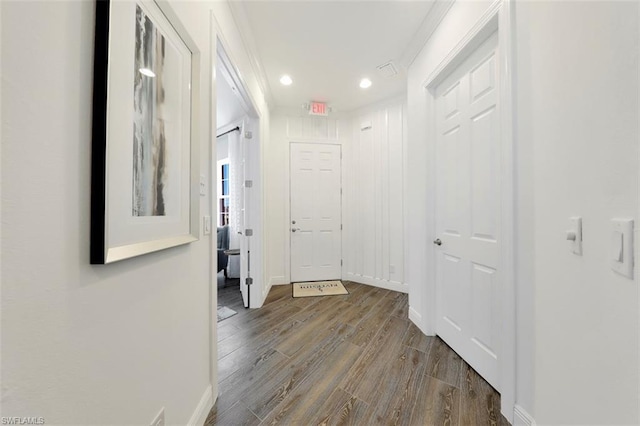 corridor featuring dark hardwood / wood-style flooring