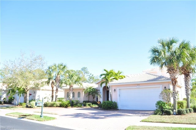 view of front of property with a garage