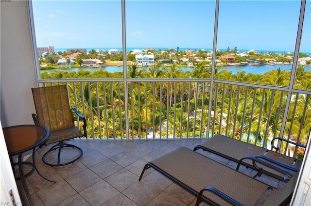 balcony featuring a water view