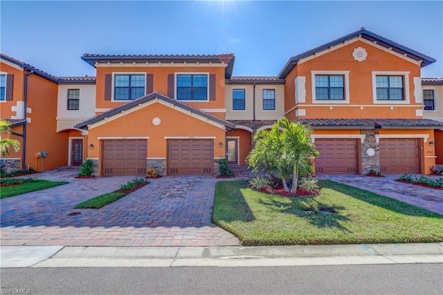 view of front of property featuring a garage