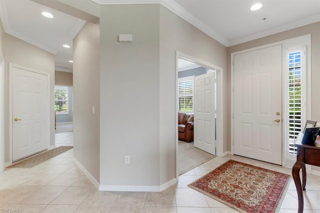 tiled entryway with ornamental molding