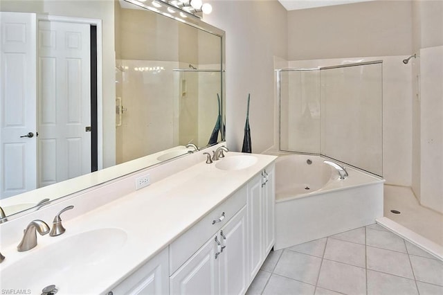 bathroom with plus walk in shower, double sink, large vanity, and tile flooring