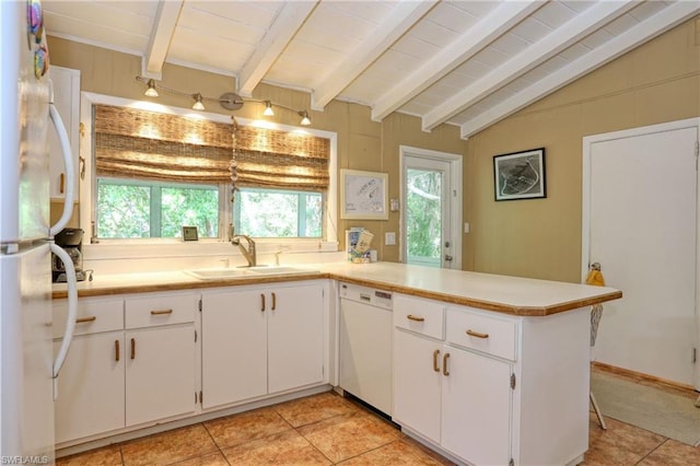 kitchen featuring light tile floors, white appliances, white cabinetry, sink, and lofted ceiling with beams