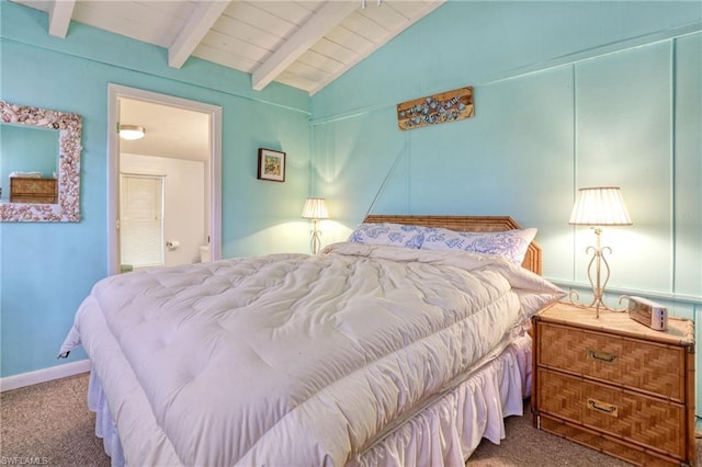 bedroom with vaulted ceiling with beams and dark carpet