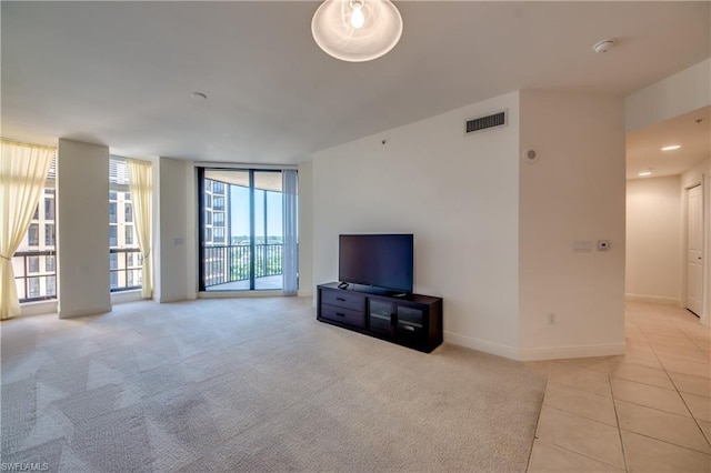 living room featuring light tile floors