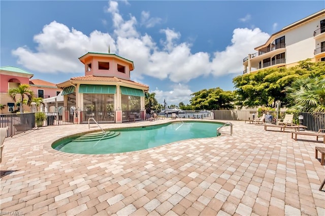 view of pool featuring a patio