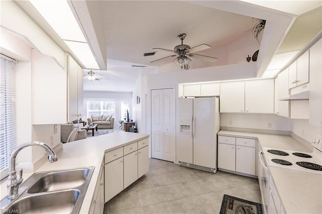 kitchen featuring white cabinetry, ceiling fan, light tile flooring, white appliances, and sink