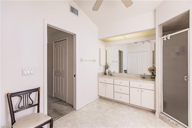 bathroom featuring an enclosed shower, ceiling fan, lofted ceiling, and tile flooring