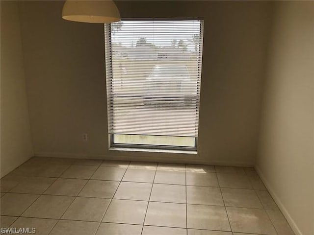 view of tiled spare room