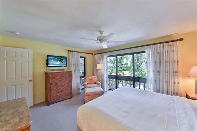 bedroom featuring ceiling fan, access to outside, and carpet