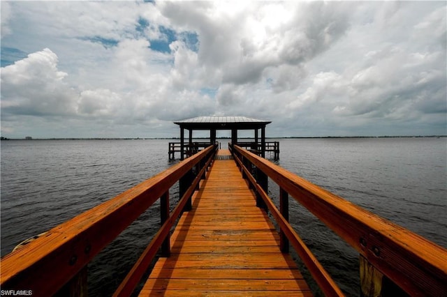 dock area featuring a water view and a gazebo