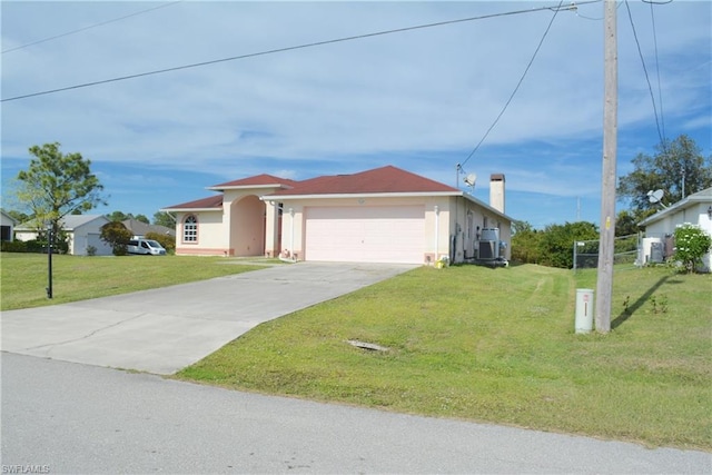 view of front facade with a front lawn and a garage