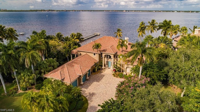 birds eye view of property featuring a water view