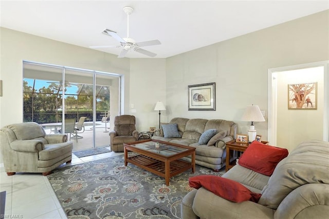 tiled living room with ceiling fan