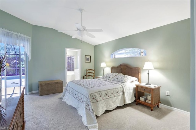 carpeted bedroom featuring access to exterior, connected bathroom, ceiling fan, and vaulted ceiling